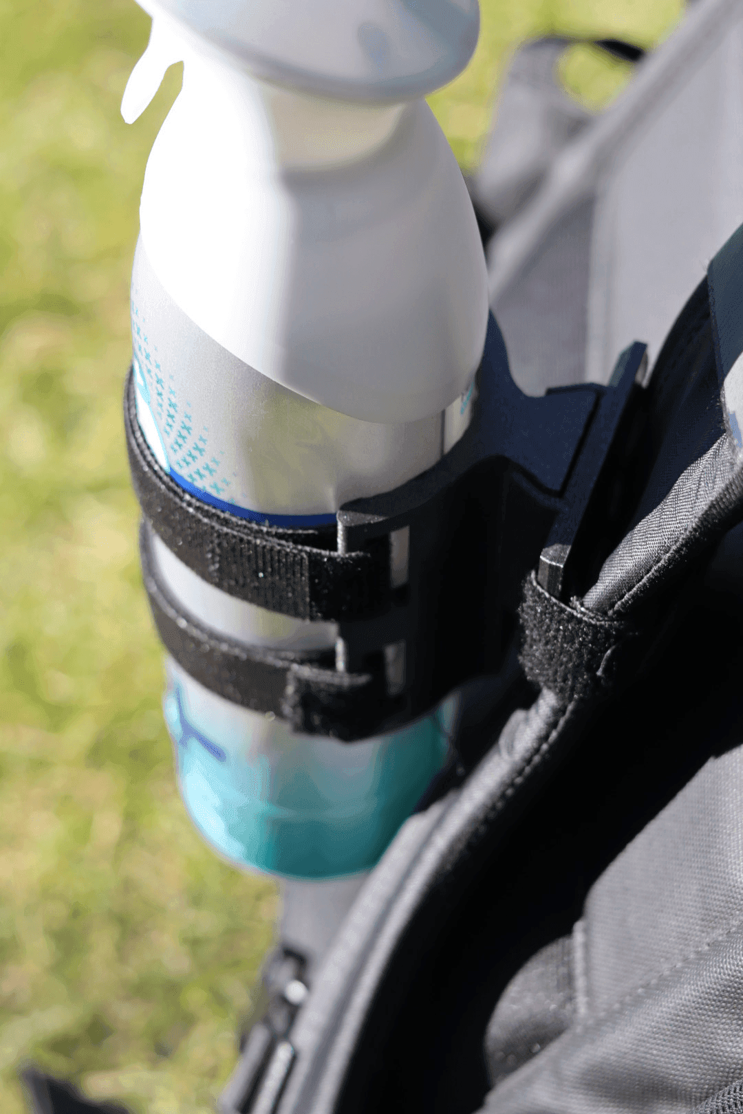 Close-up of Velcro straps and holder on shoulder strap