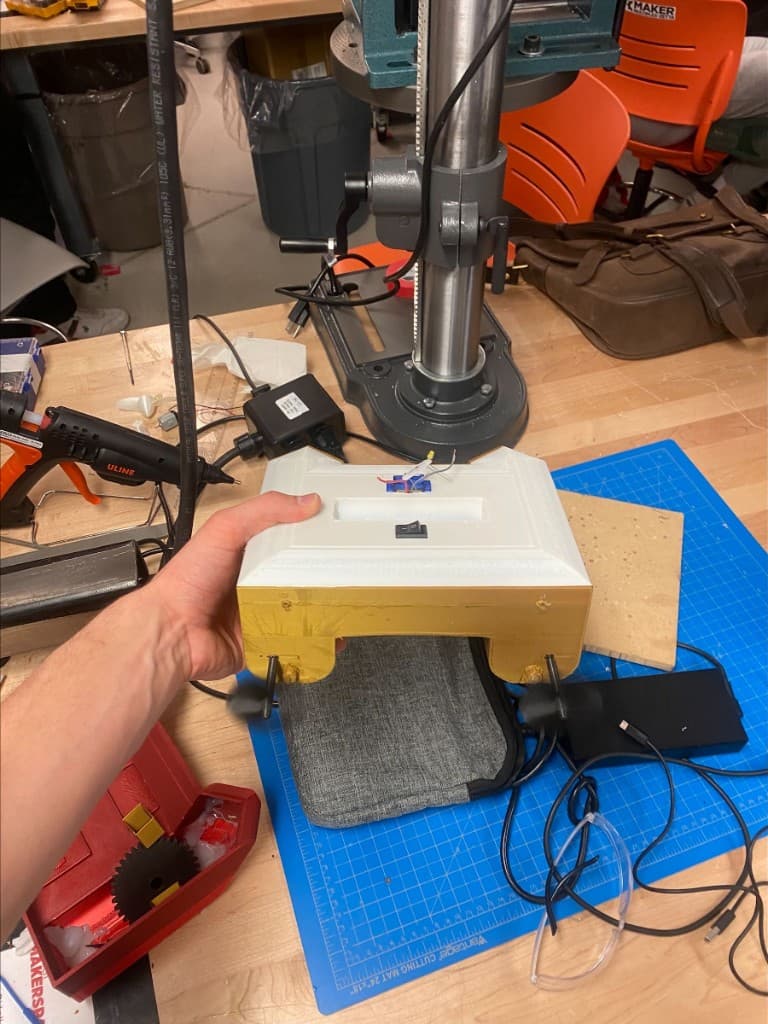 Handheld prototype with roof, switch, and propulsion checked in the makerspace