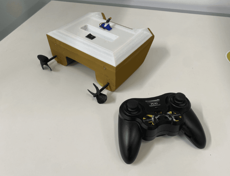 Top-down view of the completed prototype with dual propellers and controller
